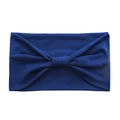 Detail of blue wide cotton yoga headband showing a soft knot and ribbed fabric texture - Blue