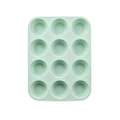 Mint green 12-cup silicone muffin pan for baking cupcakes on a white background - Silicone / 12 Cups Green