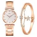 Close-up of rose gold watch set with star charm bracelet and Arabic numeral dial - Watch + Bracelet Set / Beige