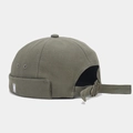 Detail of adjustable metal buckle and N embroidery on olive green canvas dock cap - Army Green