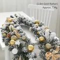 1.8m snow-flocked Christmas garland with gold balls and champagne silk bows - 1.8m Gold Garland