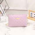 Lavender purple quilted crossbody bag with golden chain strap and metal logo plaque - Purple