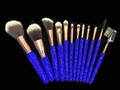 Detailed view of 12pcs makeup brushes with luxury blue glitter handles and gold ferrules - Sapphire Blue