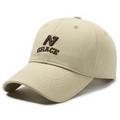 Classic beige cotton baseball cap featuring dark brown embroidered N GRACE lettering - Beige