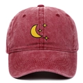 Close-up of yellow moon and star embroidery on vintage washed red cotton baseball cap - Adjustable / Burgundy