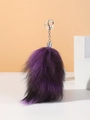 Detailed texture of purple and black faux fur fox tail keychain with silver metal clip - Black Purple