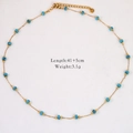Dettaglio collana dorata con perline turchesi, lunghezza 41+5 cm e peso 3,1 g - Collana di Perline Blu Turchese