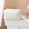Quilted white cosmetic bag for travel featuring a minimalist checkered square pattern - Octagonal Pouch / White