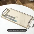 Large amber acrylic serving tray with silver handles on marble surface - Large (41×22cm) / Amber