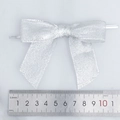 Fiocco glitter argento con chiusura metallica per confezioni regalo natalizie - Circa 9cm*9cm / Argento
