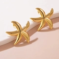 Polished gold starfish stud earrings with a 3D minimalist design and mirror finish - Gold Mirror Starfish Studs