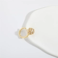 Adjustable gold open ring featuring a sphere encrusted with baguette-cut cubic zirconia - Square Zirconia / Gold