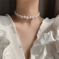 Luxurious white pearl choker necklace with interlaced pearls on model neck close-up - Pearl Choker Necklace (12#)