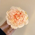 Elegant multi-layered peach gauze flower hair clip with a realistic satin texture - Peony Lotus Pink
