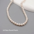 Choker necklace featuring 6.0mm near-round white freshwater pearls with high luster - Near Round