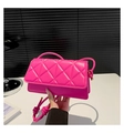 Detail of rose red quilted crossbody bag with stylish faux leather and gold strap accents - Rose Red