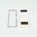 Magnetic floral list notepad with light blue background and orange flowers for fridge - Pale Blue Floral