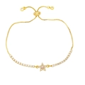 Adjustable gold star bracelet with pave zircons and purple center stone on white backdrop - Purple