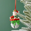Christmas snowman ornament featuring a white metal bell and festive red bow on a tree branch - Bowknot Snowman