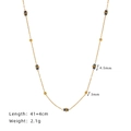 Collier de perles bleu étoilé avec touches d'acier titane doré et dimensions précises - Collier