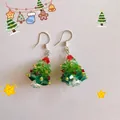 Handmade beaded Christmas tree earrings with green crystals and a red festive bow - Simple Christmas Tree-Silver / Earring Hooks
