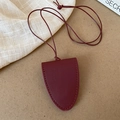 Detail view of burgundy bell-shaped leather key pouch with fine matching lanyard - 3# Necklace-Wine Red-Arc