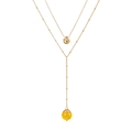 Detail of double-layered gold necklace with yellow round stone and irregular charms - Yellow Natural Stone