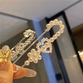Macro view of a silver waist pin with heart and flower patterns made of white pearls - Pearl Heart Flower Style (Silver)