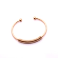 Bracciale rigido aperto in acciaio inossidabile oro rosa con terminali a sfera lucida - Oro rosa