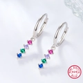 Macro shot of 925 sterling silver hoop earrings with four colored gemstone pendants - Silver/Multicolor