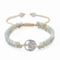 Detail of double-layer turquoise beaded bracelet with silver Tree of Life charm and knot - Amazonite