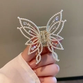 Elegante pinza per capelli a farfalla dorata con perle bianche e strass scintillanti - Stile Perla