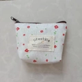 Mini canvas coin purse featuring red floral patterns and lifestyle label with black zipper - White