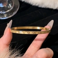 [19] Gold Roman Letter Bracelet