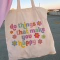 White canvas tote bag with retro floral smiley print and inspirational quote text - STD874-D Do Things That Make You Happy