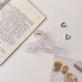 Detail of lavender matte bow hair claw clip with golden spring on minimalist background - Frosted Bow Mauve / 11cm