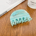 Elegant light blue marble acetate hair claw clip on a minimalist wooden table surface - 6.8cm / Striped Teal