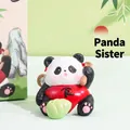 Cute resin panda figurine wearing a red vest and holding a green cabbage toy - Girl Panda / Color Box
