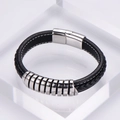 Pulsera punk para hombre de cuero trenzado con anillos de acero y cierre magnético - Negro