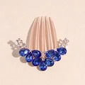 Dettaglio del pettine in oro rosa con strass blu scuro a goccia e cristalli trasparenti - Pettine a Goccia d'Acqua Blu Scuro Oro Rosa