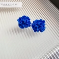 Close-up of blue flower stud earrings with pleated petals on white textured background - 23# Silver Needle-Blue (Bright Blue Five-petal Flower)