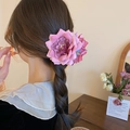Elegant large pink fabric flower hair claw clip styled on a braided hairstyle for women - Light Fuchsia Large Flower (Claw)