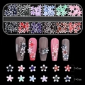Detail view of 12-grid 3D resin flower nail charms set with 7mm size reference - Blue and White Porcelain Five-Petal Flower (12TZ-12)