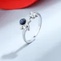 Anelli regolabili in argento con astronauta e razzo e dettagli blu stellato - Aperto Regolabile / Modello Donna (J496) / Argento