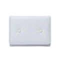 Three-fold light blue leather wallet with elegant yellow bows and pearl accents - Blue