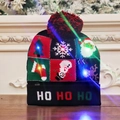 Black knitted Christmas hat with colorful LED lights and festive Ho Ho Ho pattern - Black Plaid Santa