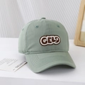 Detail of light green baseball cap with CELD embroidery on minimalist background - Light Green / 54cm (3-8 Years)
