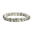 Minimalist beaded tiger eye and white stone bracelet with a textured silver focal bead - Howlite