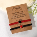Handmade woven couple bracelets set with heart charms in red and black on gift card - Red & Black Set
