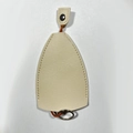 Cute beige leather pear-shaped key cover case with snap closure and metal ring strap - Solid Off-white